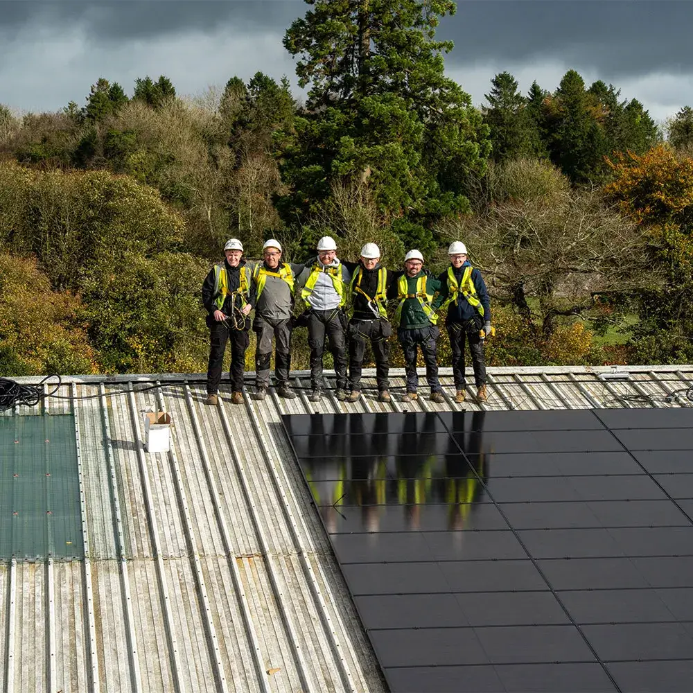 SOLARspan engineers carrying out a Commercial Solar PV installation on an Irish business rooftop, delivered by one of the best solar panel installers in Ireland and trusted by top rated best solar pv companies
